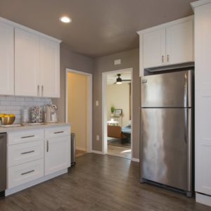 Airbnb Kitchen with Fridge, Dishwasher, White cabinets