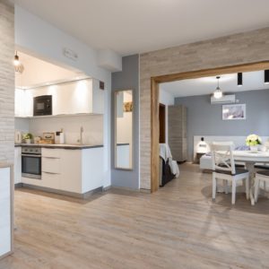 Airbnb Living Room and Kitchen view with table and chairs