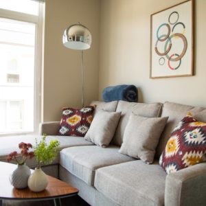 Airbnb Living Room with Big Couch and Natural Light