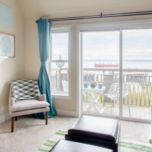 Airbnb Living Room with Chair and View of Puget Sound