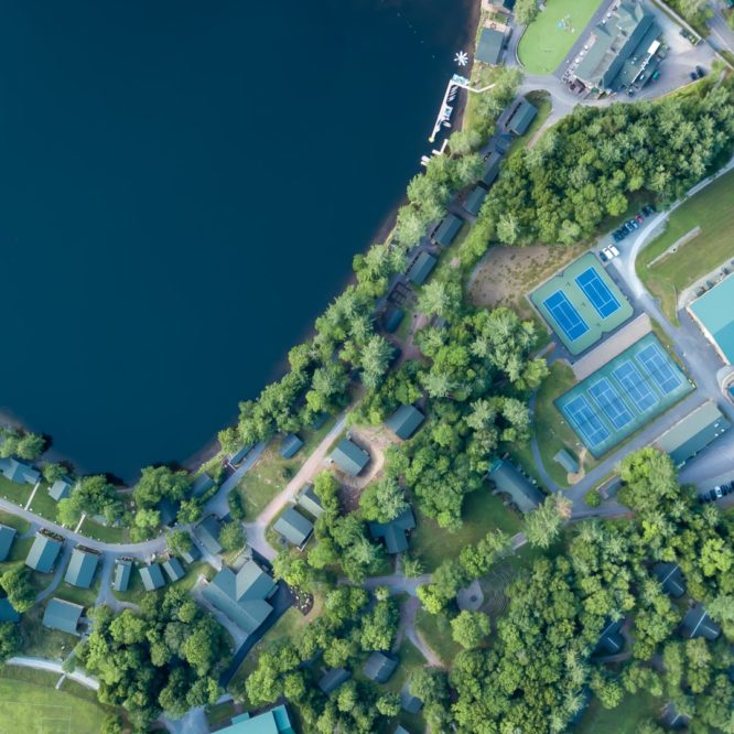 Poconos drone view house lake pool